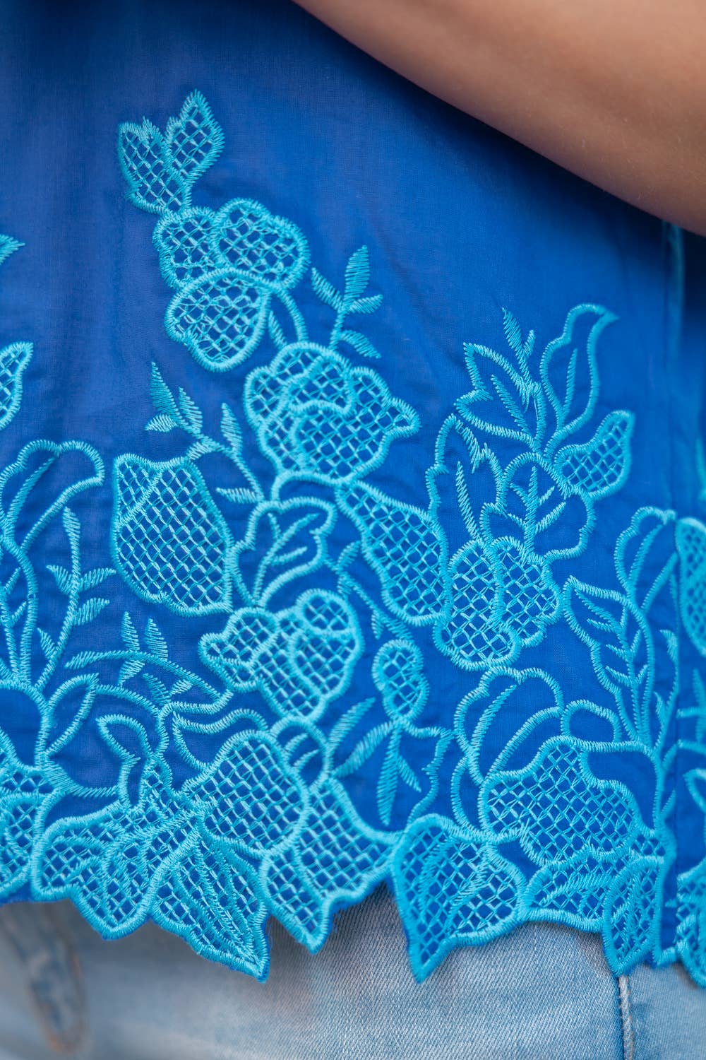 Floral Embroidered Hem Solid Top