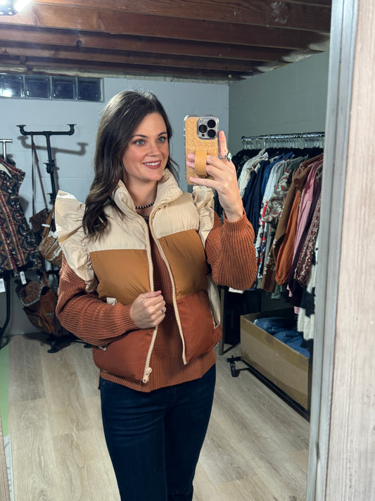 The Ritzy Color Block and Ruffle Trim Puffer Vest in Rust